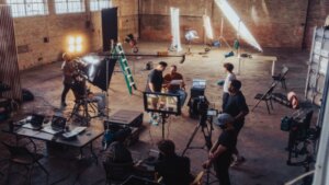 Read more about the article Film Crew Positions: Explained<span class="rmp-archive-results-widget "><i class=" rmp-icon rmp-icon--ratings rmp-icon--star rmp-icon--full-highlight"></i><i class=" rmp-icon rmp-icon--ratings rmp-icon--star rmp-icon--full-highlight"></i><i class=" rmp-icon rmp-icon--ratings rmp-icon--star rmp-icon--full-highlight"></i><i class=" rmp-icon rmp-icon--ratings rmp-icon--star rmp-icon--full-highlight"></i><i class=" rmp-icon rmp-icon--ratings rmp-icon--star rmp-icon--full-highlight"></i> <span>4.9 (8)</span></span>